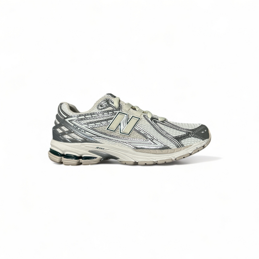 New Balance 1906 sneakers in silver with green