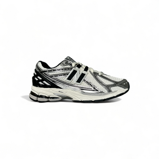 New Balance 1906 sneakers in white with black and silver