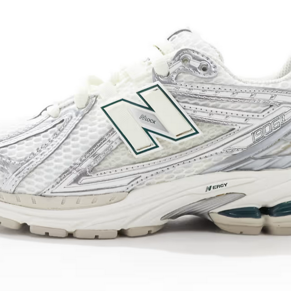 New Balance 1906 sneakers in silver with green